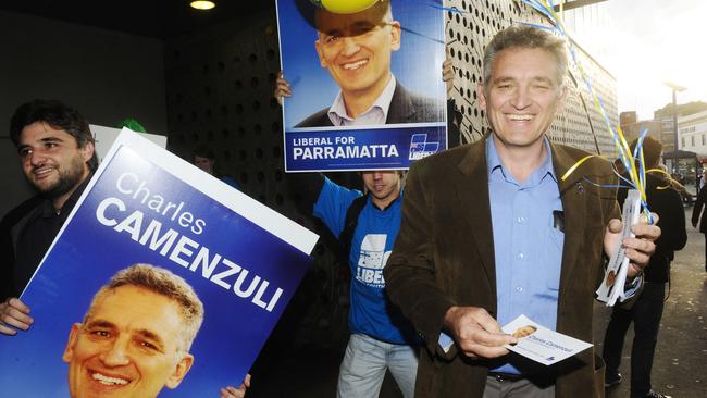 Charles Camenzuli campaigning in 2010 outside Parramatta station before the arrival of then-PM Julia Gillard. 