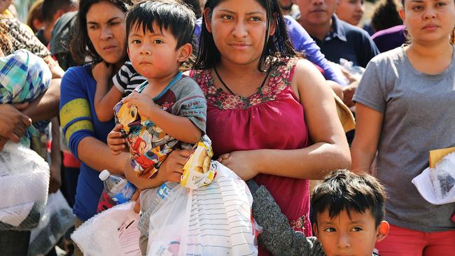 Dozens of families are released from Customs and Border Protection in Texas. Picture: AFP.