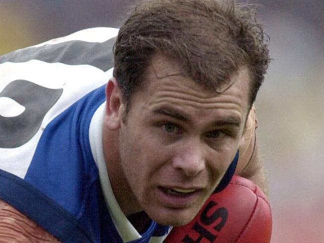 25 Jun 2000: Wayne Carey #18 for the Kangaroos , in the match between the West Coast Eagles and the Kangaroos during round 16 of the AFL season played at The Subiaco Oval in Perth Australia.DIGITAL IMAGE. Mandatory Credit: Tony McDonough/ALLSPORT