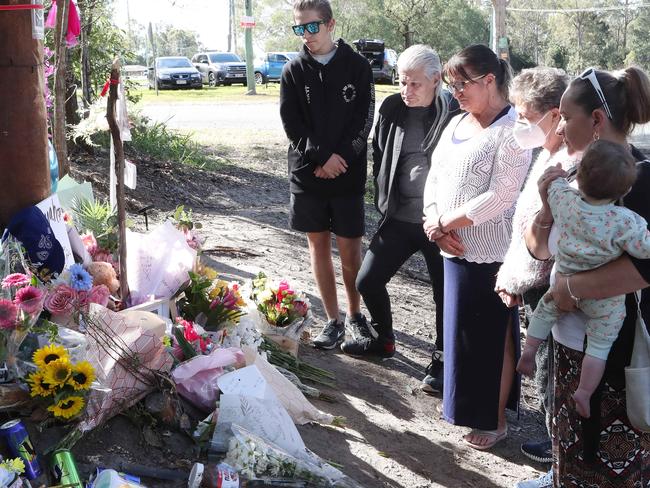 The family of Taneil Harris and Kyah Morgan at the crash site. Picture: Liam Kidston