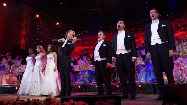 Far right Australian Gary Bennett. Andre Rieu during a 2011 concert in Mexico. Picture: supplied