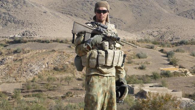 Phil Hodgkiss, pictured in the Mirabad Valley in Afghanistan, says he ‘lost control of his world’ when he returned.