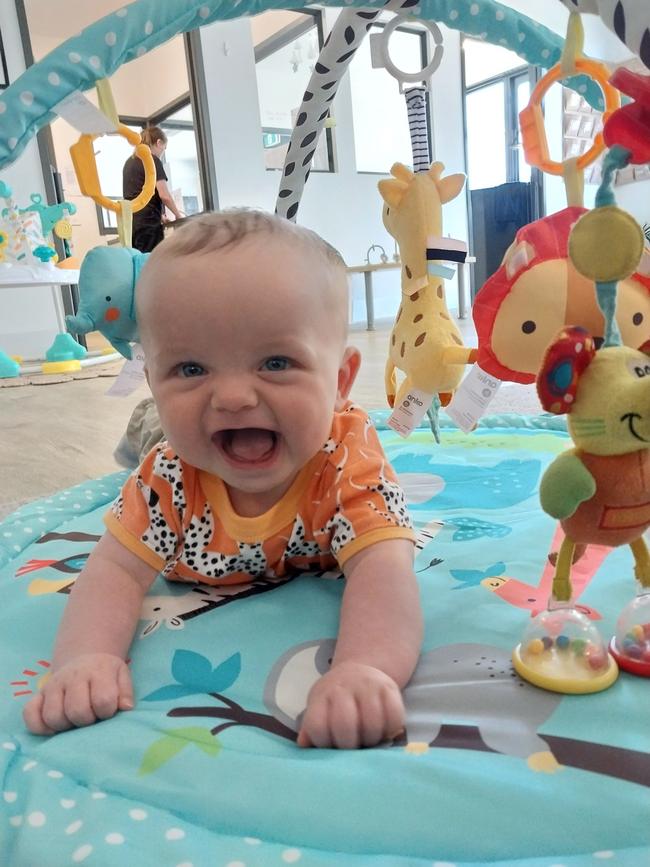 Troy Hume, seven months old. He is really into face grabbing as well as having the loudest little cackle and it doesn't take much to get a smile, he is a little flirt.