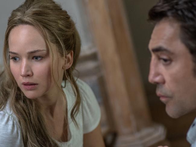 Jennifer Lawrence (as Mother Earth) and Javier Bardem (as “a form of God”) a scene from mother!