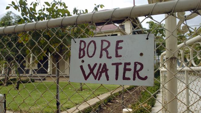 Bore water use could be banned in seven suburbs because of toxic water.