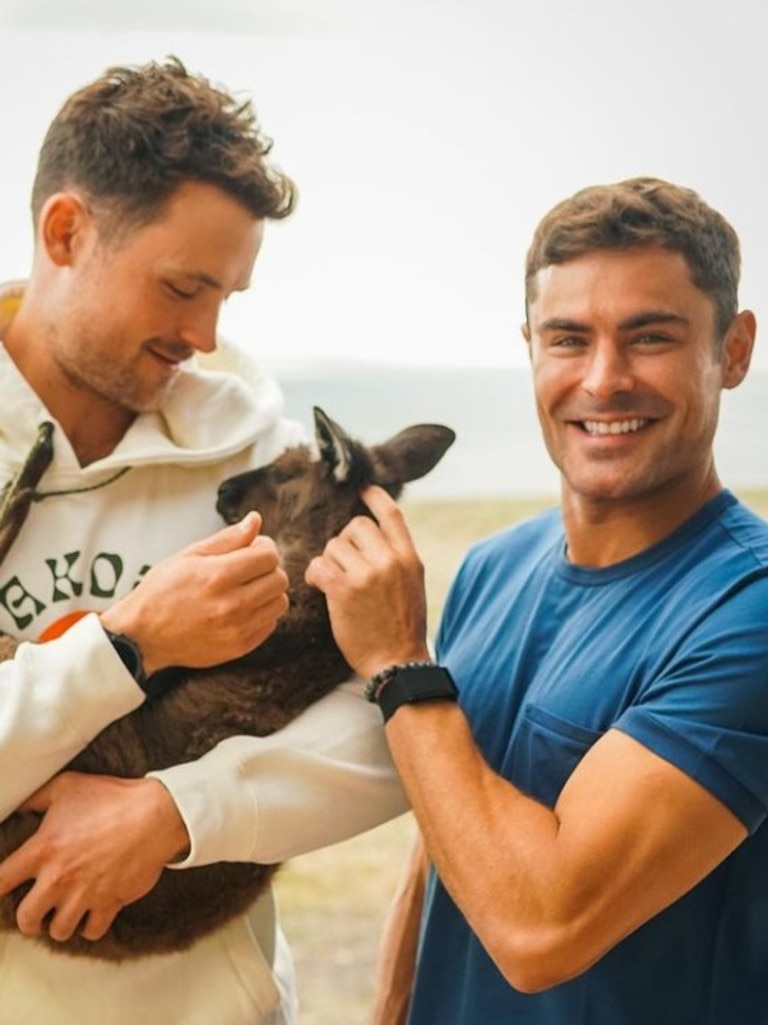 Dylan Efron with brother Zac Efron undertaking the ‘critical’ work of hugging a kangaroo on Kangaroo Island. Picture: zacefron/Instagram