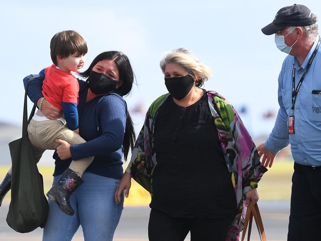 Memphis Francis is reunited with his mother Dominique Facer at Archerfield airport in Brisbane. Picture: Dan Peled/NCA NewsWire