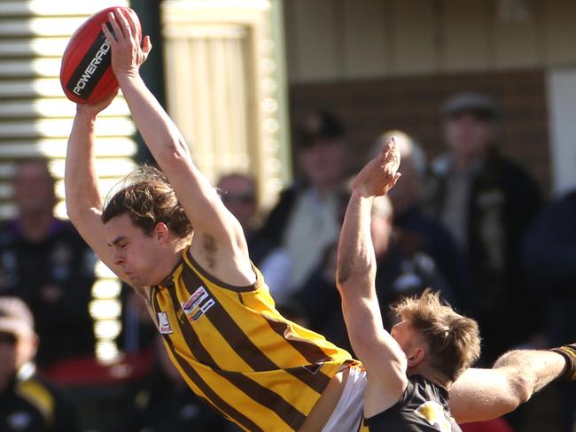 Lachlan McDonald flies for a mark. Picture: Stuart Milligan