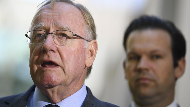 Liberal Senator Ian Macdonald, pictured with National Matt Canavan, says Mr Joyce knows his actions are ‘derailing the government’.