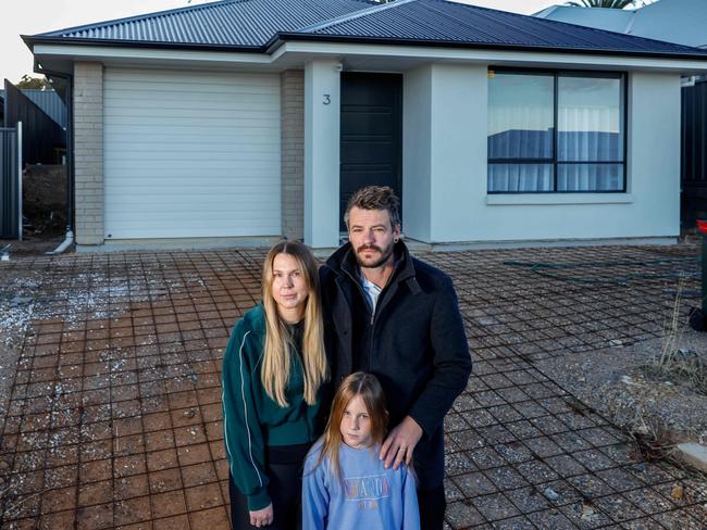 The Barratt family has to watch their step just walking out the front door, with the concrete mesh posing a tripping hazard. Picture: Russell Millard Photography