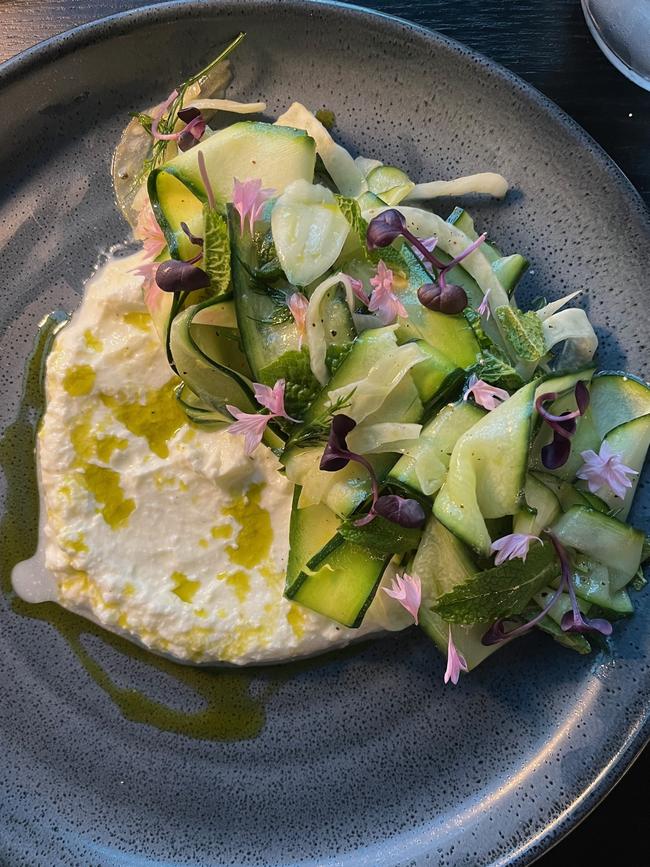 Leatherwood’s zucchini cucumber salad which features a tangle of lightly dressed and thinly shaved zucchini and cucumber which sits atop a puddle of fresh Tongola cheese. Picture: Supplied