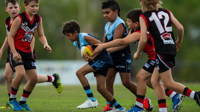 Under-10s compete in the first Darwin Buffaloes NTFL home against Southern Districts game at Woodroffe Oval. Picture: Pema Tamang Pakhrin