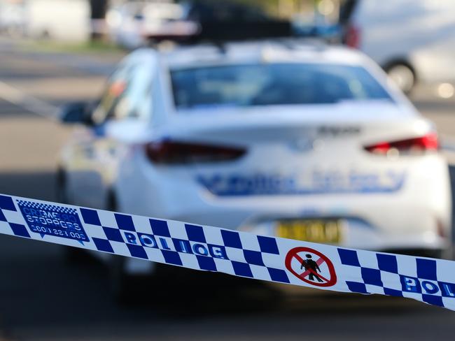 SYDNEY, AUSTRALIA - NEWSWIRE PHOTOS June 14 2022: A general stock image of a Police tape in front of a Police car in Sydney. Picture NCA Newswire/ Gaye Gerard.