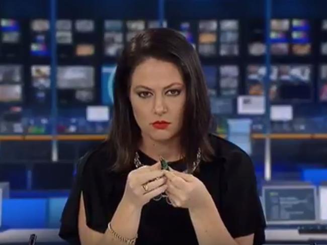 The moment just before she realises she’s on air.