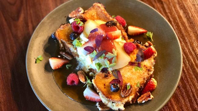 Vue Lounge, New Farm, Baked French toast with poached pear, rhubarb, mascarpone, berries, pecans and maple syrup. Picture: Belinda Seeney