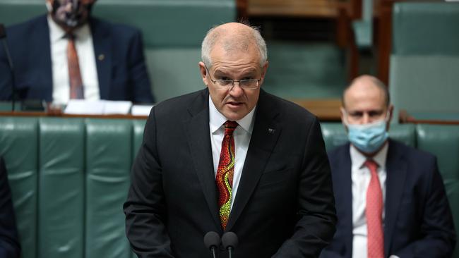 Wearing an indigenous tie, Prime Minister Scott Morrison delivers his Closing The Gap speech in the House of Representatives in Parliament House in Canberra today. Picture: NCA NewsWire / Gary Ramage