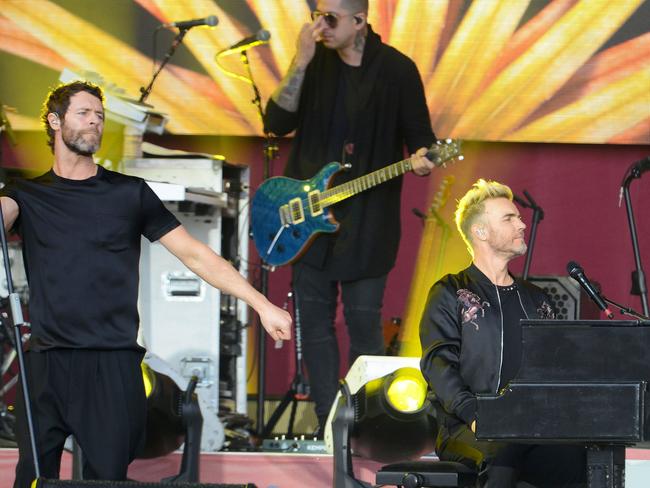 Howard Donald (L)and Gary Barlow (R) of Take That perform at the One Love Manchester benefit concert for the families of the victims of the May 22, Manchester terror attack, at Emirates Old Trafford in Greater Manchester on June 4, 2017. Picture: Dave Hogan for One Love Manchester