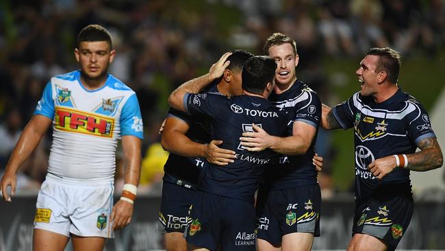 Jason Taumalolo celebrates after scoring a try for the Cowboys.