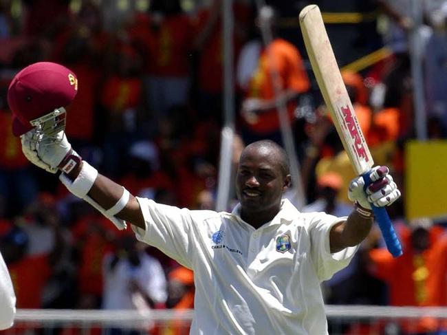 Brian Lara celebrates breaking the world record of 380 against England in 2004.