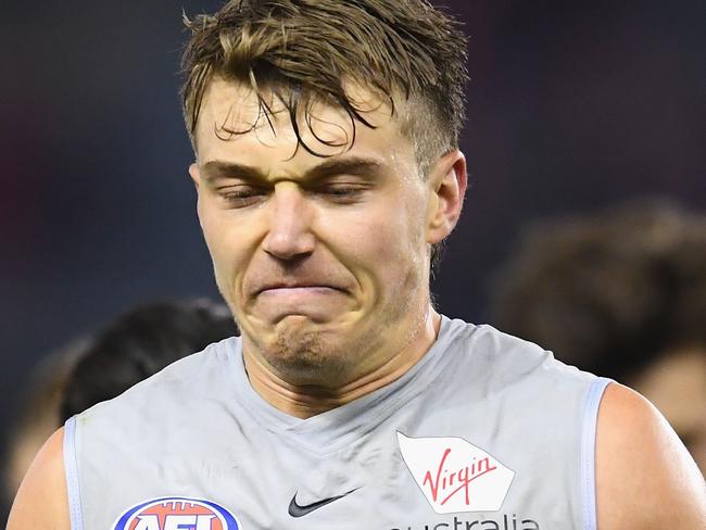 Patrick Cripps of the Blues looks dejected after losing the round 17 AFL match between the St Kilda Saints and the Carlton Blues