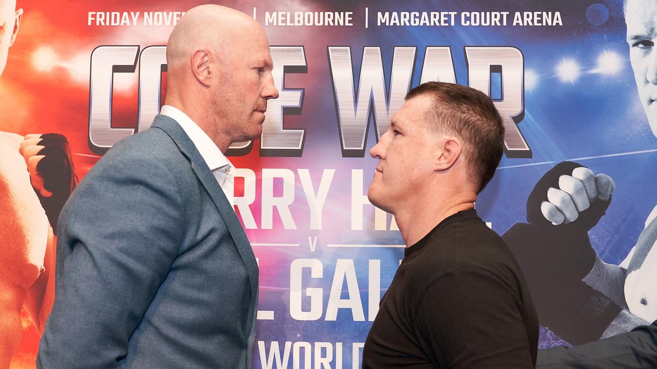 Former AFL player Barry Hall and retired Cronulla Sharks player Paul Gallen face off during a Code War boxing launch in Melbourne.