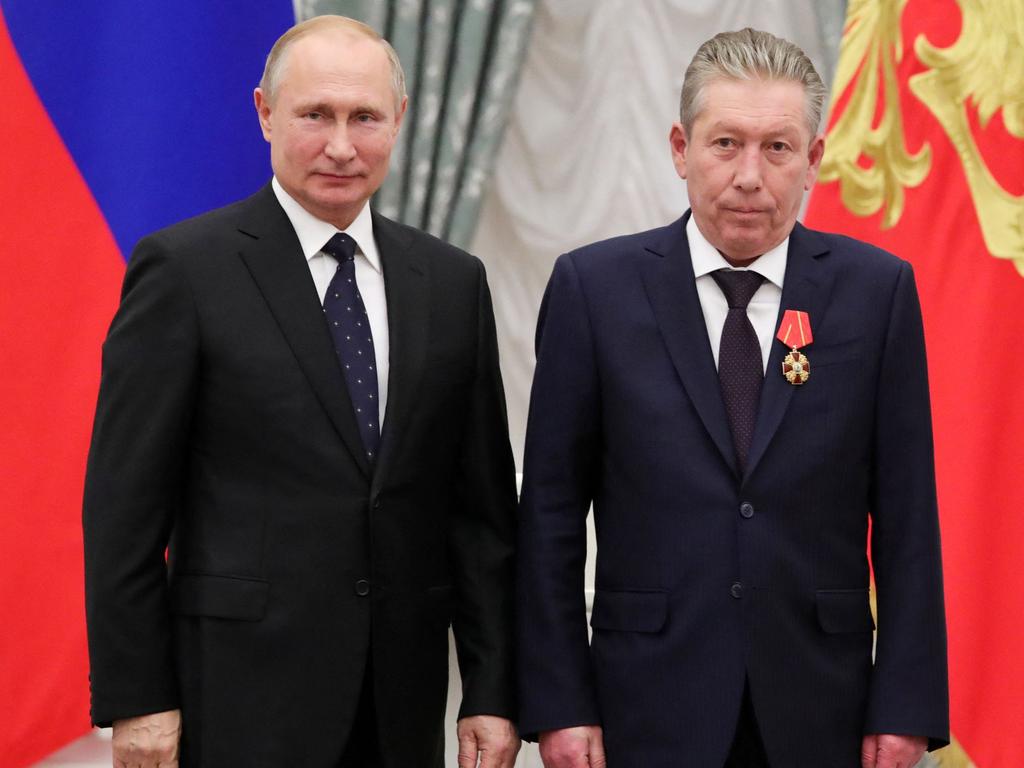 Russia's President Vladimir Putin and Ravil Maganov pose for a photo during an awarding ceremony at the Kremlin in Moscow. Picture: AFP