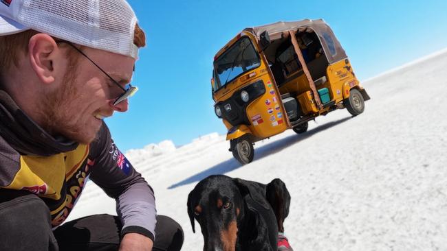 Ryan Magee, his rescued Doberman Patt, and his Tuk Tuk. Photo: Ryan Magee