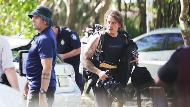 Police dive crews at the scene at Noosa Heads on Sunday morning. Picture: Lachie Millard