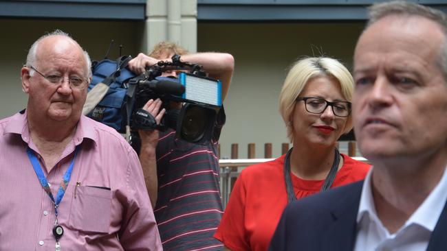 Bill Shorten addresses the media at the Cairns Hospital with Cairns and Hinterland Hospital and Health Service chairman Clive Skarott and Labor candidate for Leichhardt Elida Faith in the background. PICTURE: CHRIS CALCINO