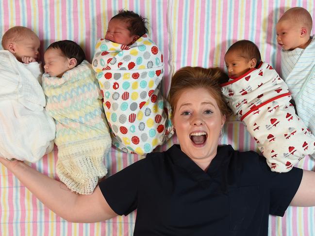 Mercy Werribee midwife Ciara Noble with five of the total 328 bubs born in January. Picture: Josie Hayden