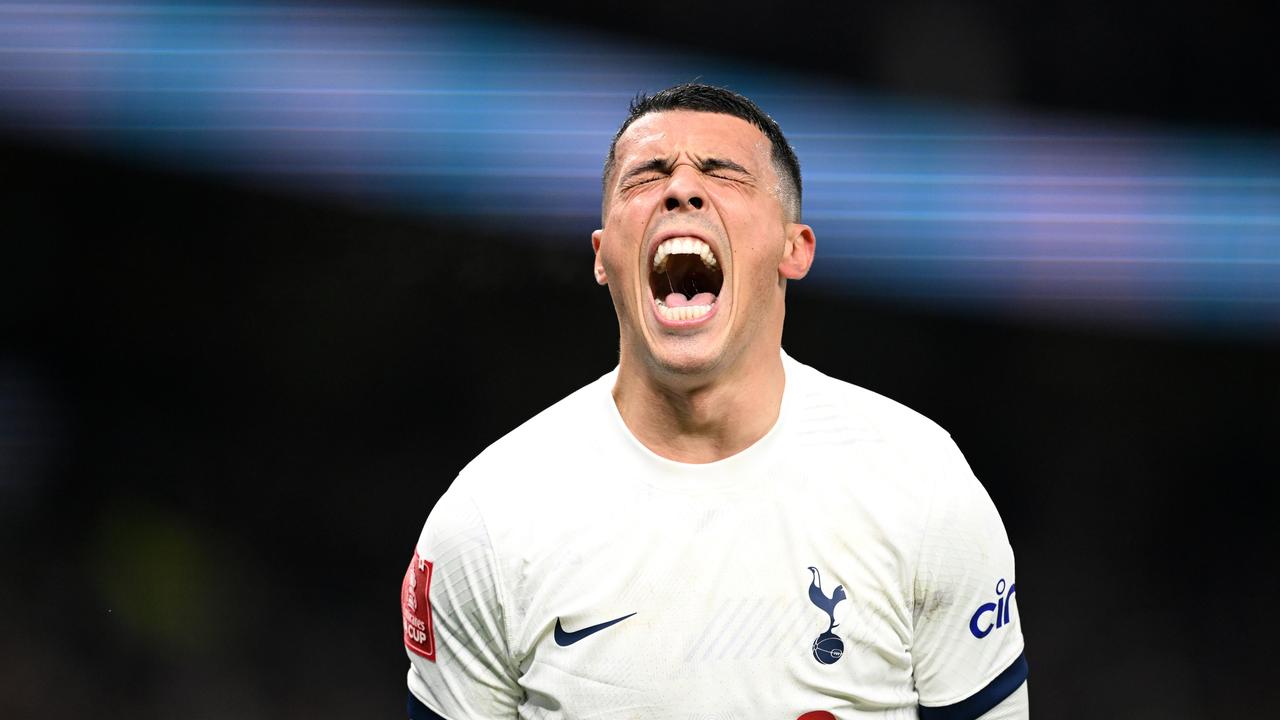 Pedro Porro celebrates after scoring. Photo by Shaun Botterill/Getty Images.