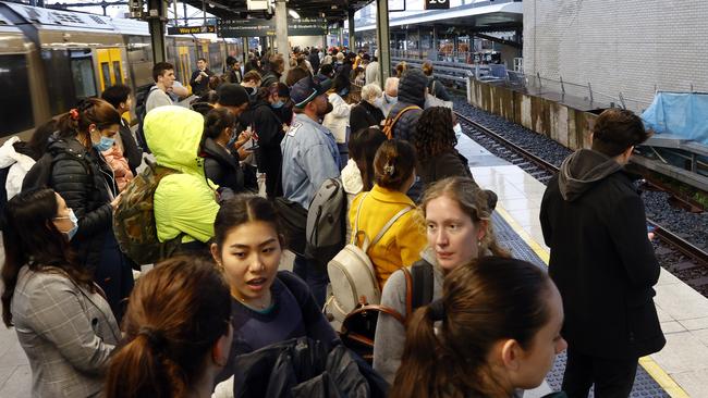 Commuters waiting for their train to the north shore at Central Station earlier this month. They have been impacted by the ongoing train strike which has today affected the Northern line. Picture: Richard Dobson