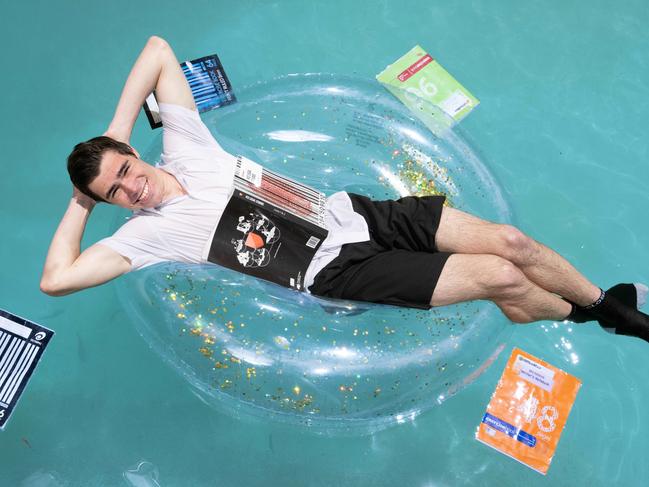 Jacob Lawrence makes a splash in his pool after finding out he achieved four study scores above 40 on ATAR. Picture: Tony Gough