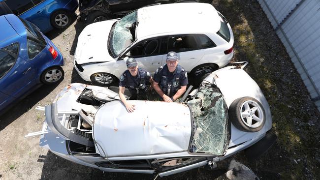 Retiring Major Crash officers Peter Light and Wayne Liebich have seen it all. Picture: Tait Schmaal