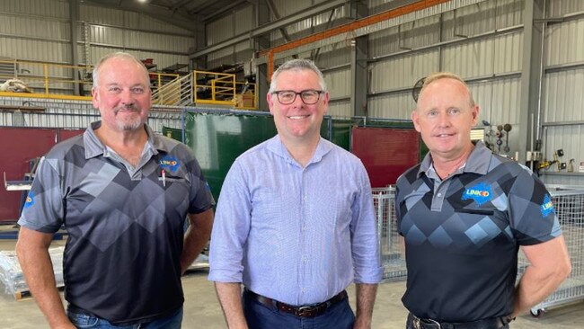 Linked Group Services CEO and co-owner Peter Shaw, Federal Labor’s Queensland resources spokesman Murray Watts and Linked Group Services Managing Director and co-owner Jason Sharam. Picture: Steph Allen.