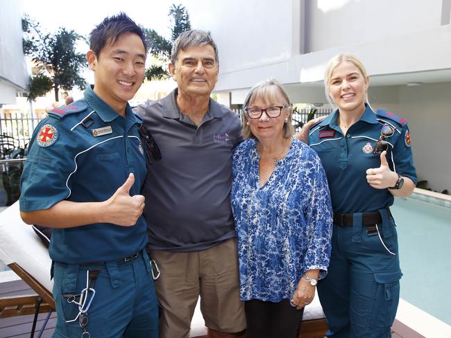 QAS paramedics Tomoaki Shiratsuchi and Annie Reid with their patient Brenley Milson OM and his wife Suzanne. Picture: Tertius Pickard