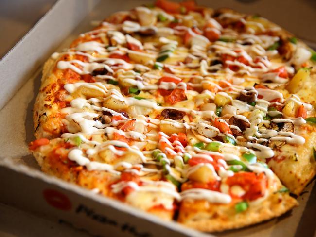 Veggie Sensation pizza at the new Pizza Hut Marsden Park. Marsden Park, Thursday, February 1st 2018. Pizza Hut Australia is giving away free pizza for one day only at its new dine-in restaurant in Marsden Park. (AAP Image / Angelo Velardo)