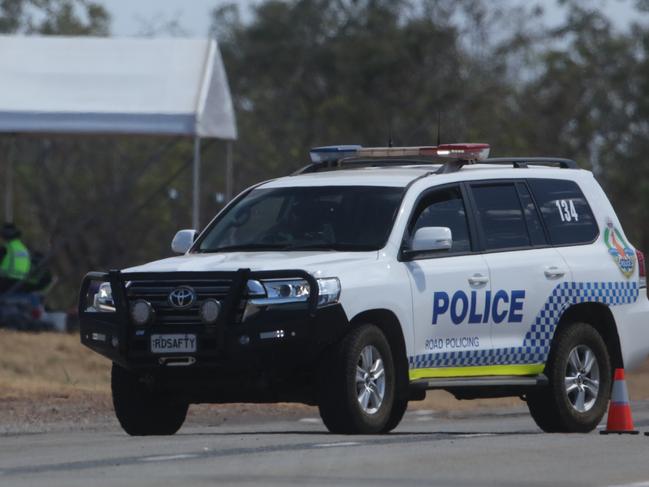 An NT Police roadblock on the Stuart Highway as Katherine goes into lockdown due to COVID 19 restrictions.Picture: Glenn Campbell