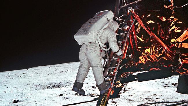 Buzz Aldrin descends from the lunar module. Picture: AFP / NASA