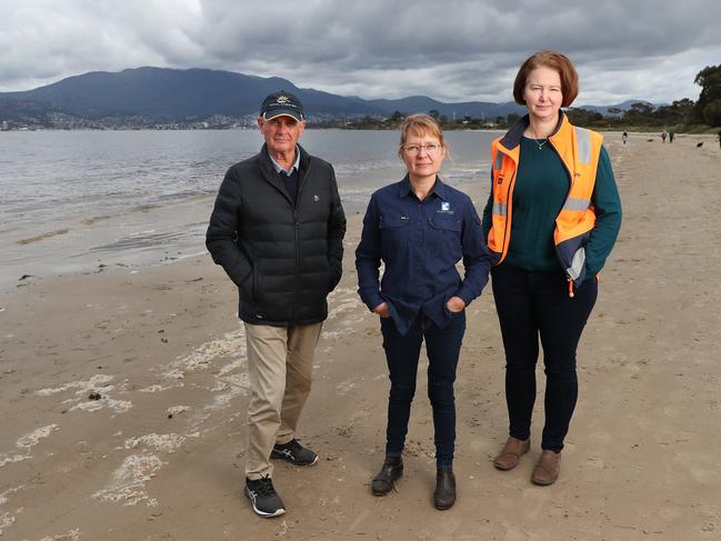 Clarence Mayor Doug Chipman, Derwent Estuary Program chief executive Ursula Taylor and TasWater system performance and productivity department manager Fran Smith on Howrah Beach. Picture: Nikki Davis-Jones