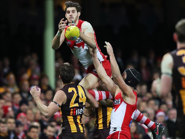 Sam Naismith flies high for the Swans against Hawthorn at the SCG. Picture: Phil Hillyard