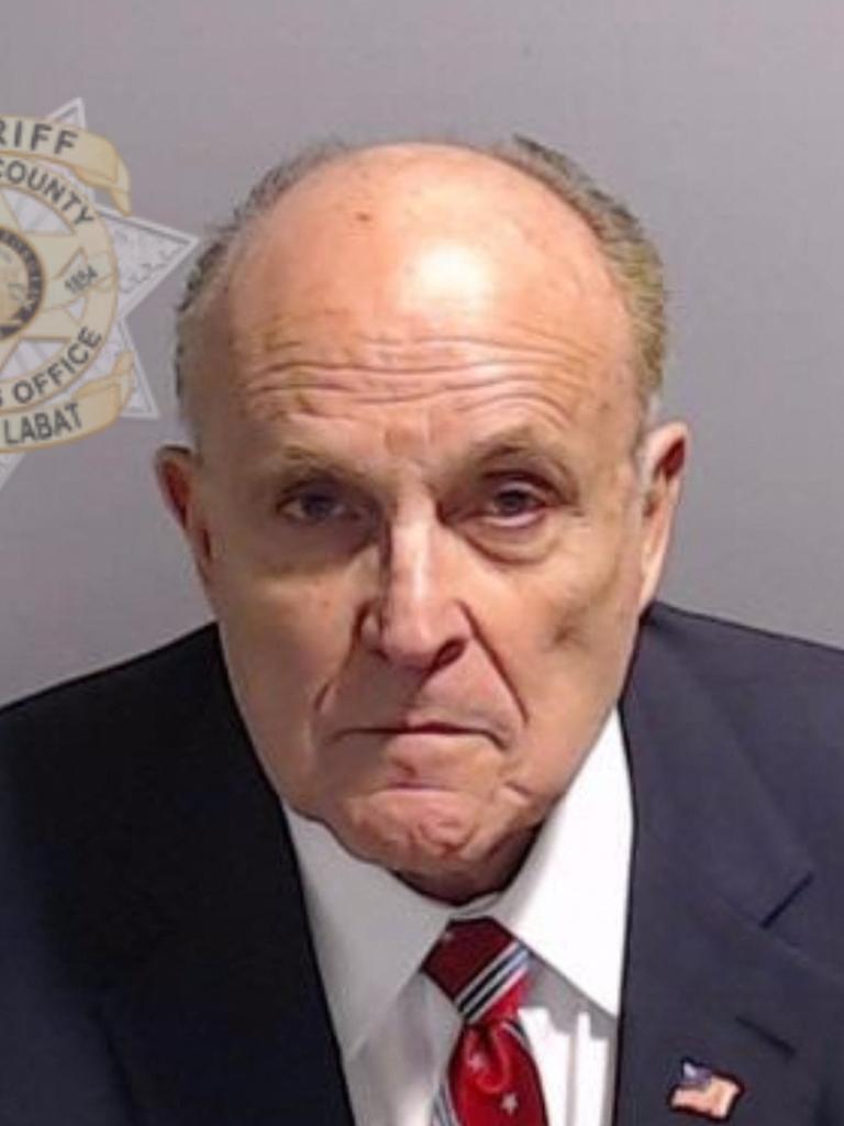 The mug shot of former New York City Mayor and lawyer of Donald Trump, Rudy Giuliani. (Photo by FULTON COUNTY SHERIFF'S OFFICE / AFP).