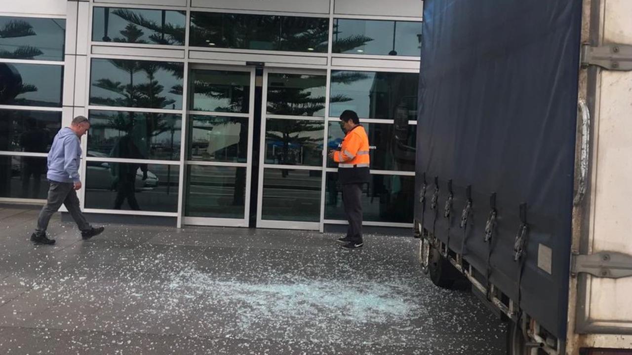 A truck has crashed into the front entrance of AFL House. Photo via @BenSutton1