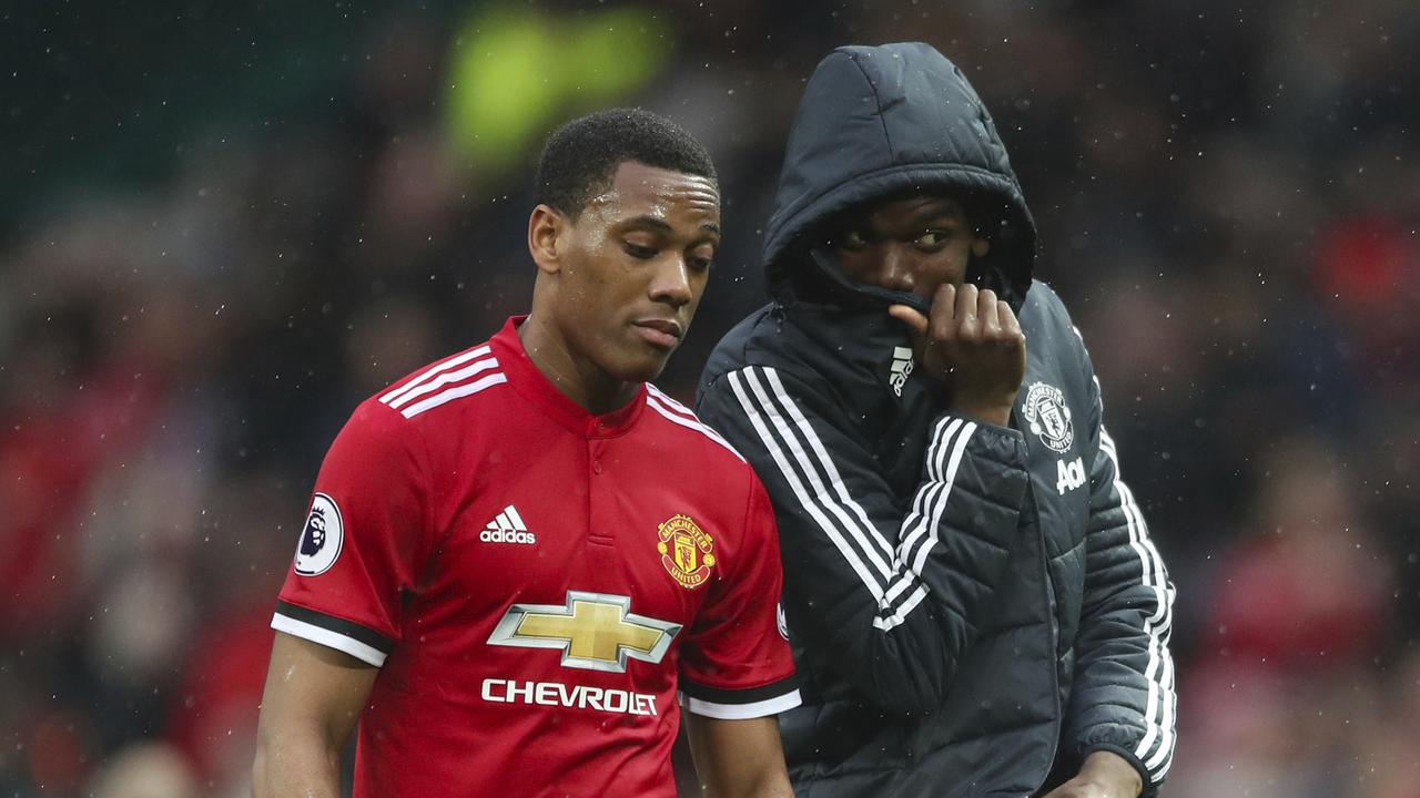 Manchester United's Anthony Martial, left, and Manchester United's Paul Pogba