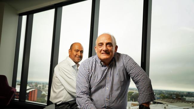 Sigma CEO Vikesh Ramsunder and Chemist Warehouse co-founder Mario Verrocchi. Picture: Luis Enrique Ascui