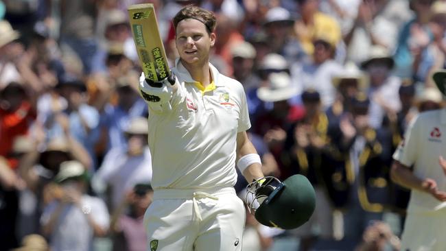 Australia's Steve Smith celebrates after scoring a century during the third day of their Ashes cricket test match against England in Perth, Australia, Saturday, Dec. 16, 2017. (AP Photo/Trevor Collens)