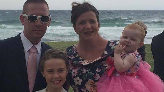 Dreamworld tragedy victim Kate Goodchild with partner Dave Turner and daughters Ebony and Evie.