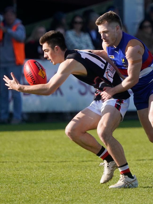 Patrick Sinnema with the ball for Devon Meadows.