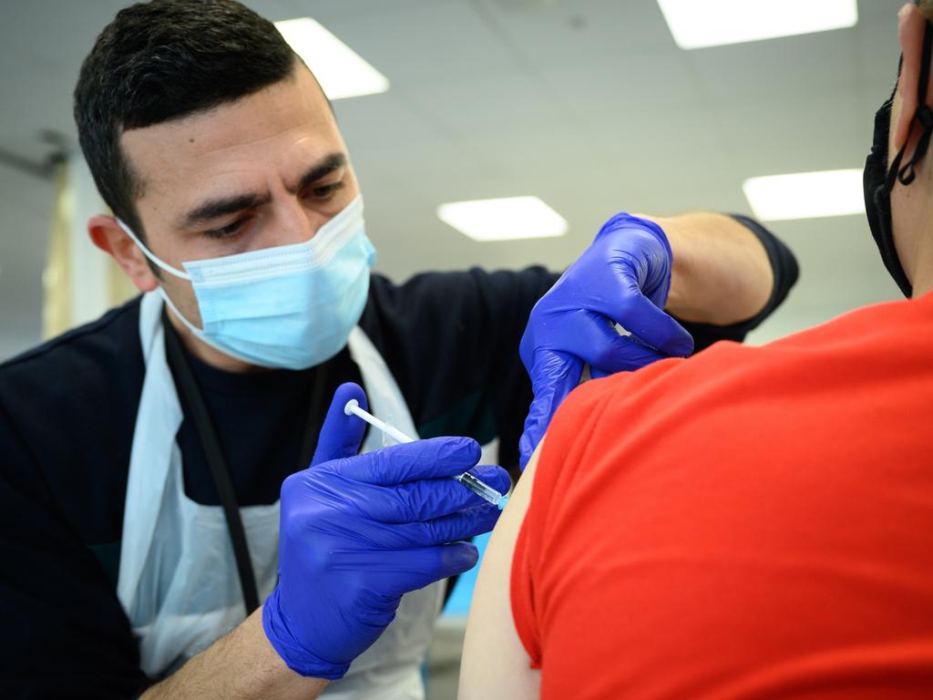 A man receives his Covid-19 vaccination booster jab at the Sir Ludwig Guttmann Health &amp; Wellbeing Centre in the Stratford area of London. Picture: Getty Images