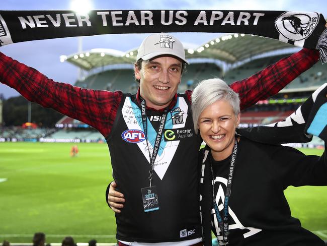 HOPE: Port Adelaide fans Bill and Sarah Noblet say their team is the dark horse of the finals. <b>Picture: SARAH REED</b>